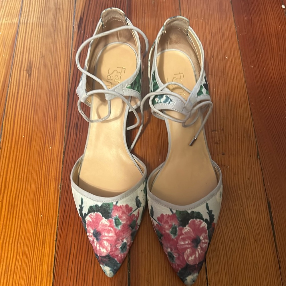 Kitten heels with a front ankle tie.